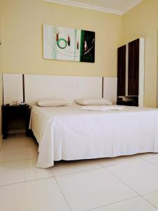 Postel nebo postele na pokoji v ubytování Hotel Capuchins