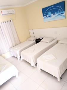 Postel nebo postele na pokoji v ubytování Hotel Capuchins