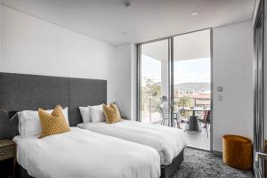 Postel nebo postele na pokoji v ubytování Argo Apartments