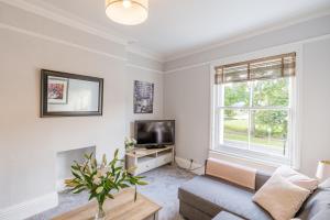 TV a/nebo společenská místnost v ubytování Upper Swan View Apartment