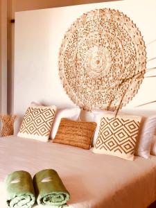 Ein Bett oder Betten in einem Zimmer der Unterkunft Mangata Boutique Bungalows