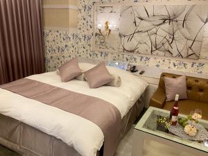 Letto o letti in una camera di Hotel Venus Garden(Adult Only)