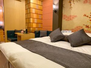 Letto o letti in una camera di Hotel Venus Garden(Adult Only)