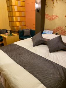Letto o letti in una camera di Hotel Venus Garden(Adult Only)