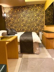Letto o letti in una camera di Hotel Venus Garden(Adult Only)