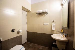 Koupelna v ubytování KSTDC Hotel Mayura Valley View Madikeri