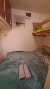 Postel nebo postele na pokoji v ubytování Onix - Orfű Apartman