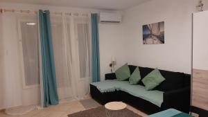 Prostor za sedenje u objektu Onix - Orfű Apartman