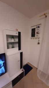 TV i/ili multimedijalni sistem u objektu Onix - Orfű Apartman