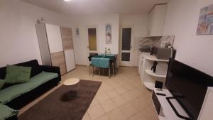Prostor za sedenje u objektu Onix - Orfű Apartman