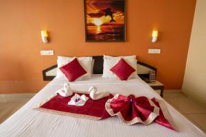 Postel nebo postele na pokoji v ubytování KSTDC Hotel Mayura Valley View Madikeri