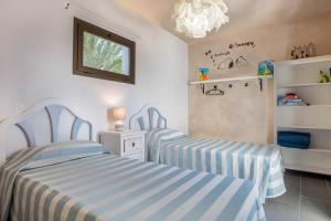 A bed or beds in a room at Villa La Era 1