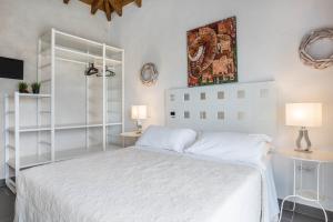 A bed or beds in a room at Villa La Era 1