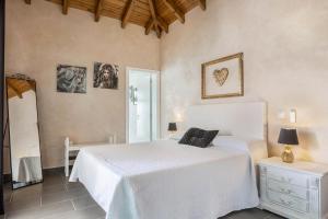 A bed or beds in a room at Villa La Era 1