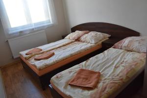 Postel nebo postele na pokoji v ubytování Willa Białe Piaski Pokoje i Noclegi Białogóra