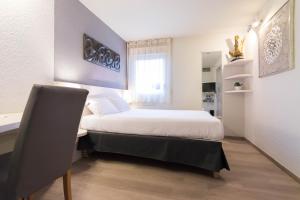 Postel nebo postele na pokoji v ubytování ibis Styles Strasbourg Nord Palais des Congrès
