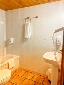 Kúpeľňa v ubytovaní Delta Hotel