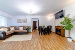 TV a/nebo společenská místnost v ubytování MIKRAS LUXURY APARTMENT