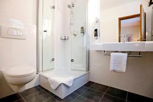Ένα μπάνιο στο Hotel Restaurant Fronmühle 3 Sterne Superior +20 φωτογραφίες
