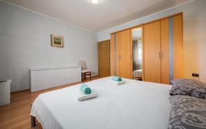 Posteľ alebo postele v izbe v ubytovaní IVA house with apartment