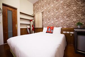 Letto o letti in una camera di 荷風民宿