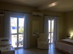 Voodi või voodid majutusasutuse Cithos Hotel toas