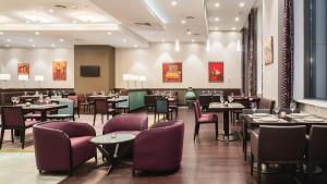 En restaurang eller annat matställe på Holiday Inn - Kyiv, an IHG Hotel