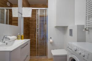 Kúpeľňa v ubytovaní RentPlanet - Apartamenty Górna Resorts