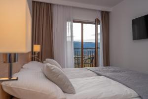 Posteľ alebo postele v izbe v ubytovaní RentPlanet - Apartamenty Górna Resorts