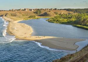 an aerial view of a beach next to the water at Apart Hotel Apolonia Palace in Sinemorets