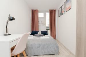 Posteľ alebo postele v izbe v ubytovaní ShortStayPoland Krochmalna (B17)