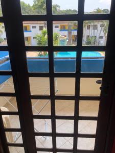 Vista de la piscina de Residencial LA CORTE vamos o alrededores