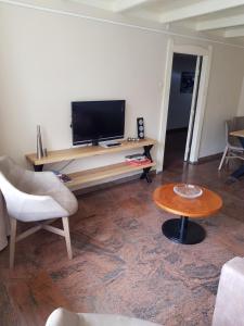 Et tv og/eller underholdning på All Exclusive Apartments