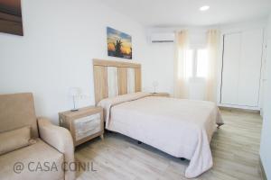 Postel nebo postele na pokoji v ubytování Casa Jupiter