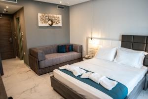 Posteľ alebo postele v izbe v ubytovaní Lagaria Hotel