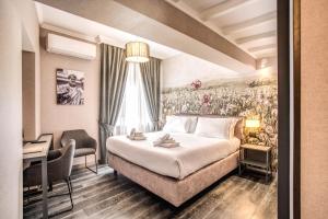 Voodi või voodid majutusasutuse PAX hotel toas