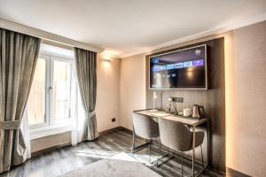 A television and/or entertainment centre at PAX hotel