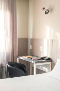 Postel nebo postele na pokoji v ubytování Hotel Melo