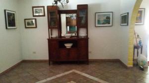 a bathroom with a sink and a mirror on the wall at La Vecchia Lanterna da Ines...... in Romagnano al Monte
