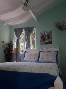 Letto o letti in una camera di Simon says Grand View Villa