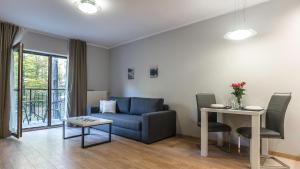 Posedenie v ubytovaní Apartamenty Sun & Snow Resort Karkonosze