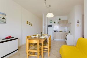 Kuchyň nebo kuchyňský kout v ubytování Cortina 2-34