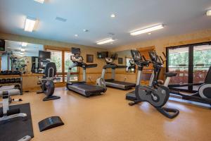 a gym with several treadmills and exercise bikes at Canyon Creek in Steamboat Springs