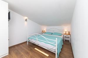 Postel nebo postele na pokoji v ubytování Perla Castellana