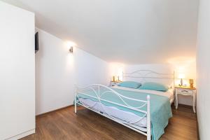 Postel nebo postele na pokoji v ubytování Perla Castellana