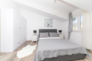 Postel nebo postele na pokoji v ubytování Perla Castellana