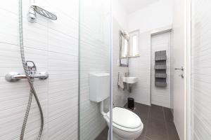 Koupelna v ubytování Perla Castellana + 37 fotografií
