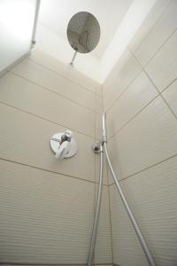 a shower in a bathroom with a shower at La Marina in Ancona