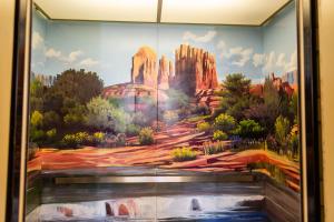 a mural of a painting of a mountain at Canoa Ranch Golf Resort in Green Valley