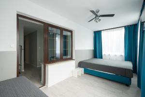 Posteľ alebo postele v izbe v ubytovaní KOMFORT WILLA + 37 fotografií